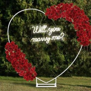 White metal heart arch and sign